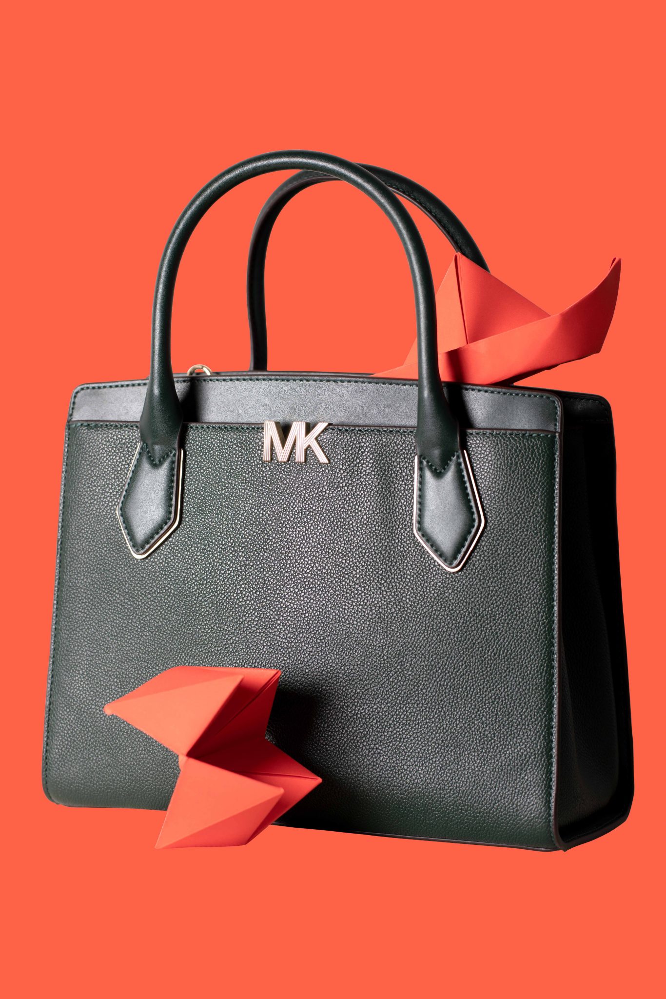 Commercial photo of a Michael Kors handbag